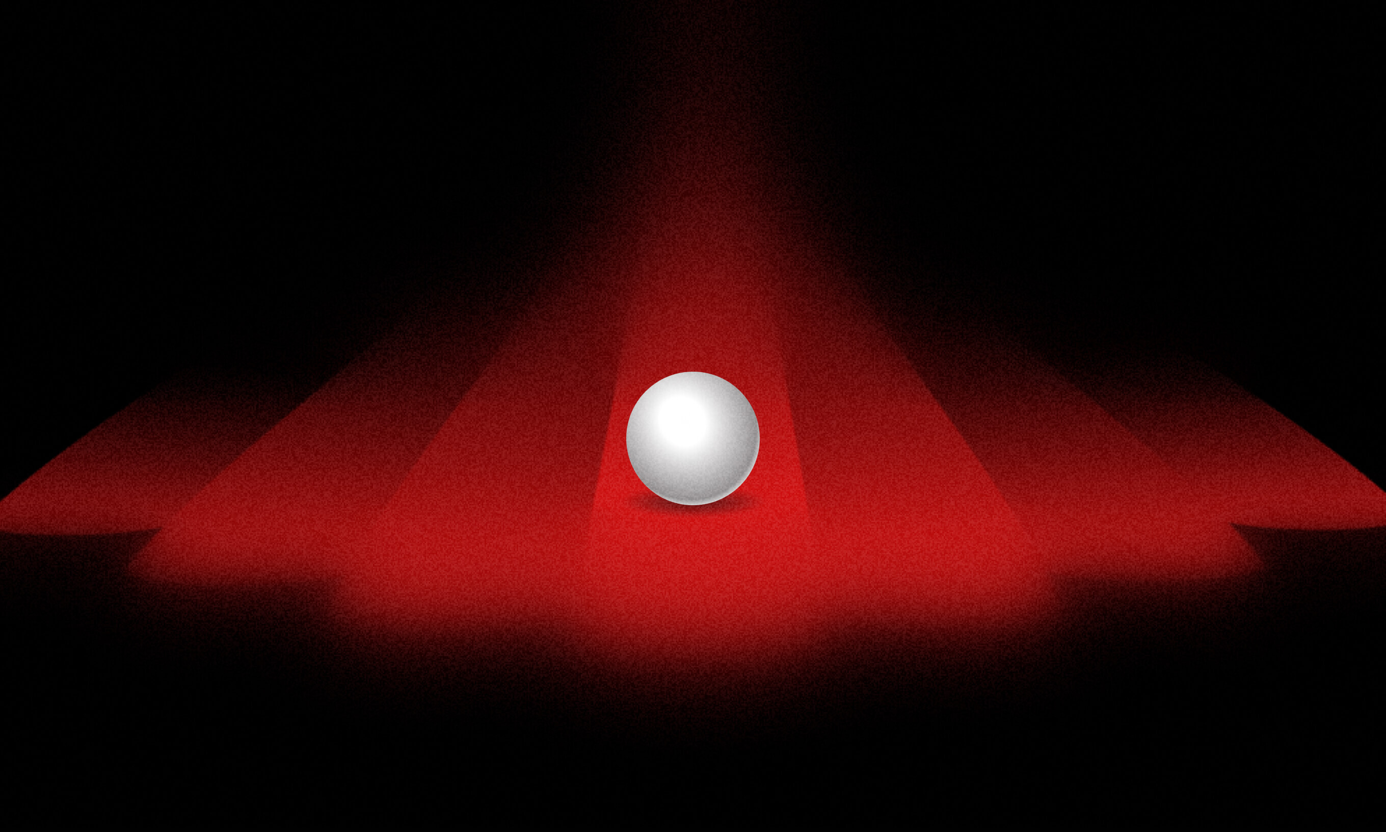 A white, pearl-like ball illuminated by red spotlights, symbolizing the clarity and focus Ruby on Rails development companies bring to web development projects.